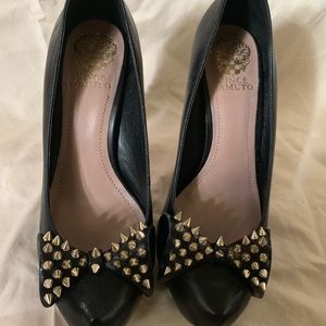 Black heels with gold spikes